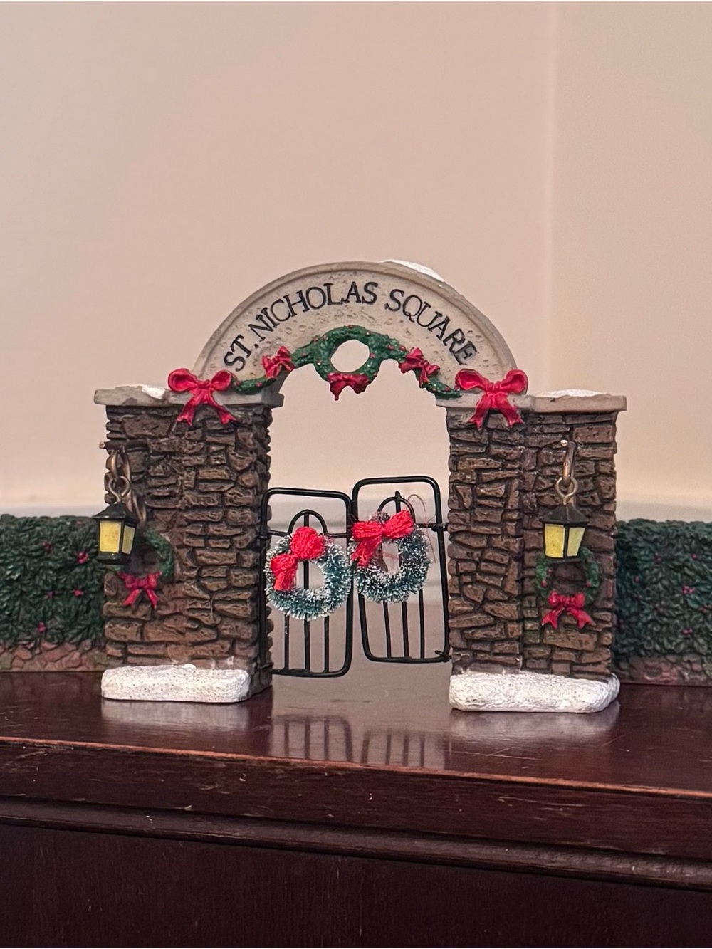 St. Nicholas Square Brown and Green Holiday Gate with Red Accents